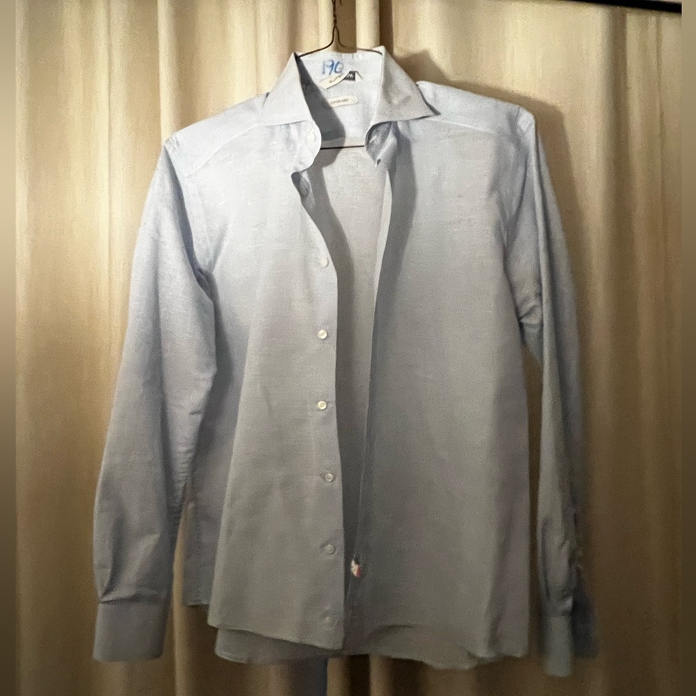 Just back frdry cleaner  like new see note 
Banana Republic Lt Blue dress shirt